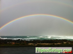 <p>South Broulee beach on a stormy afternoon with a lovely double rainbow.</p>